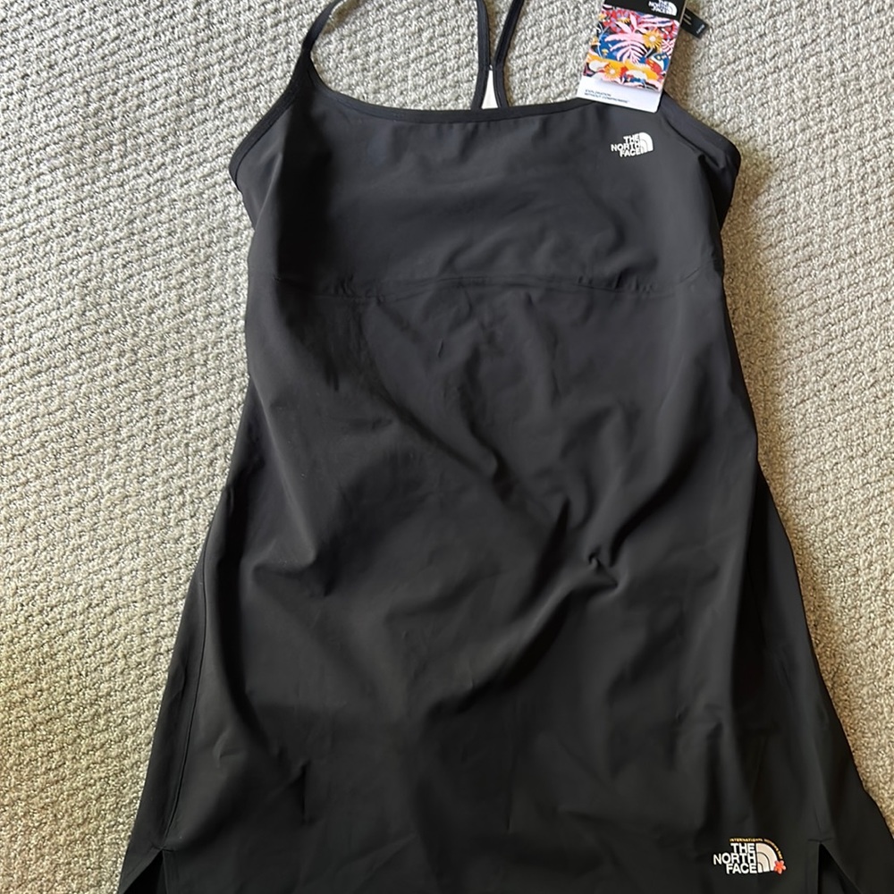 Brand new with tags. North Face Arque Dress-medium